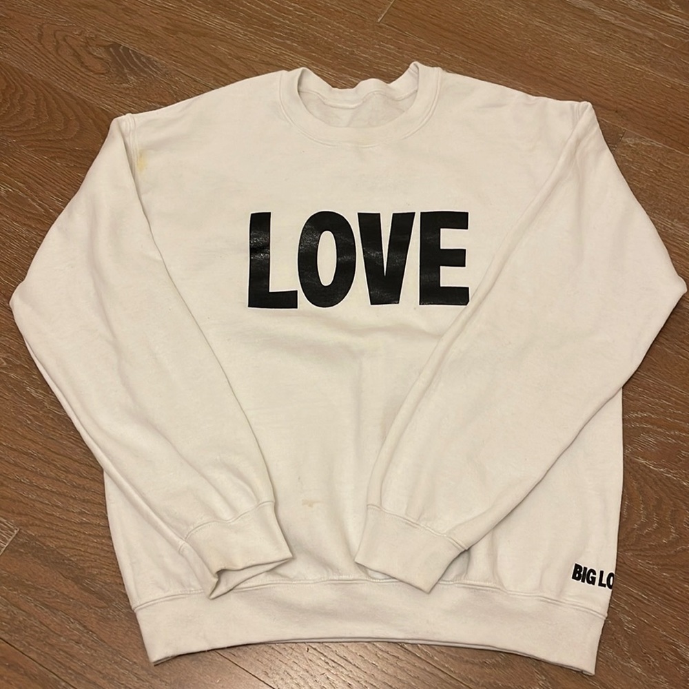 NEW LISTING! Brand new white sweatshirt with the word LOVE on front.Never worn